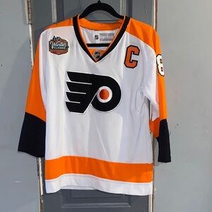 Reebok Kids Black, Orange, and White Hockey Jersey